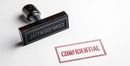 A stamp that reads confidential