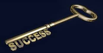 Old fashioned gold key with success written at the end