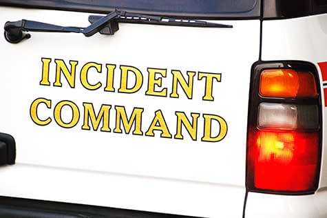Incident command written on the back of a truck