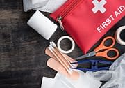 first aid kit laid out on table