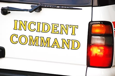 Incident command written on the back of a truck