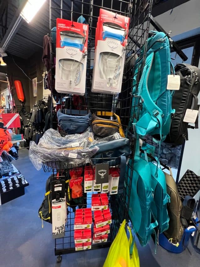 bags displayed inside a dive shop