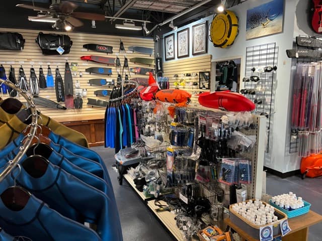 inside of the dive shop with lots of colorful products on display
