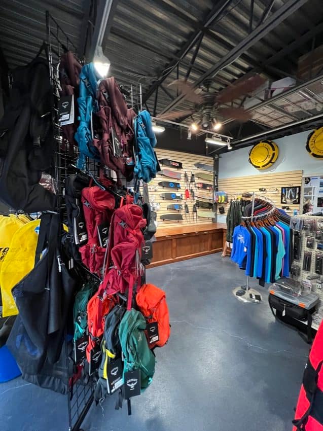bags and other products displayed inside a dive shop