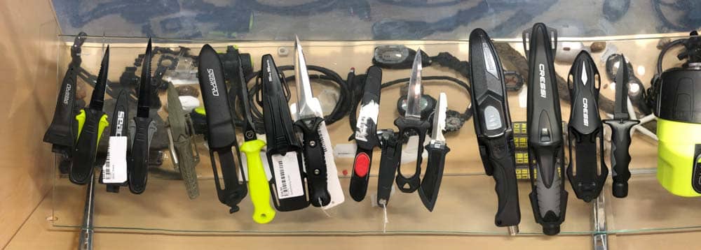dive knives in display case