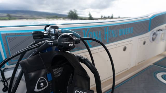 inside a boat with dive gear