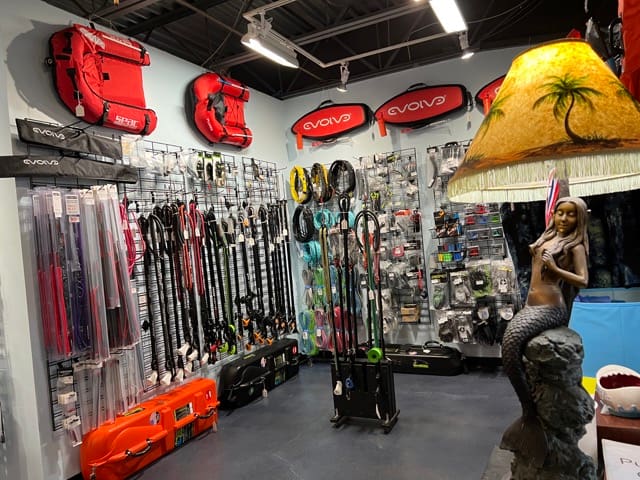 inside dive shop spearfishing section