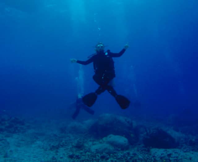 diver hovers in the water