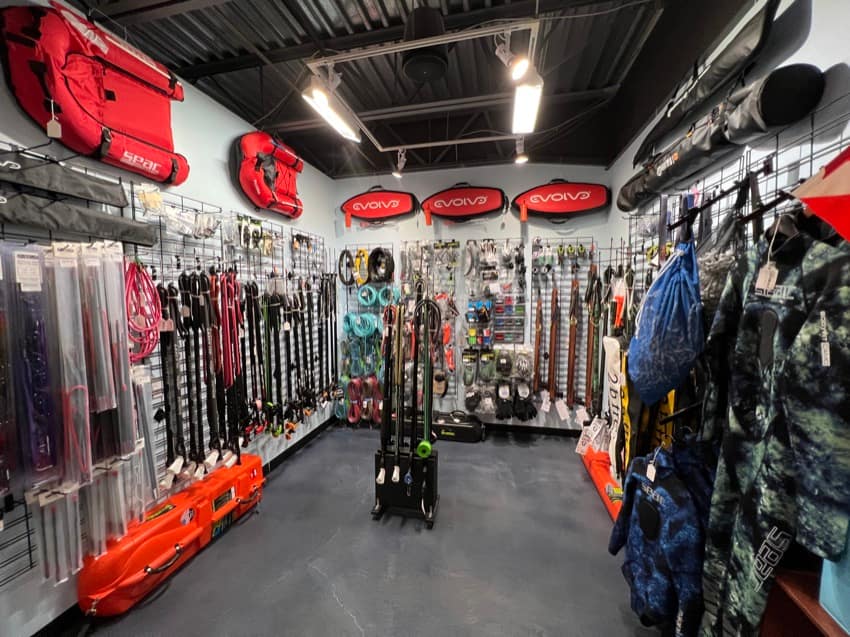 inside of Kona Honu Divers dive shop spearfishing section
