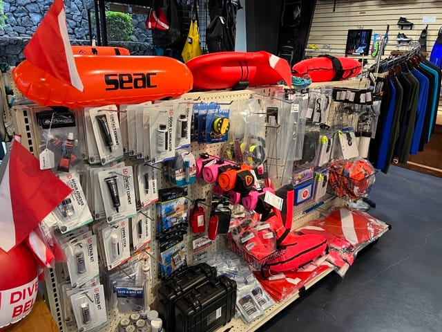 products displayed on shelves inside a dive shop