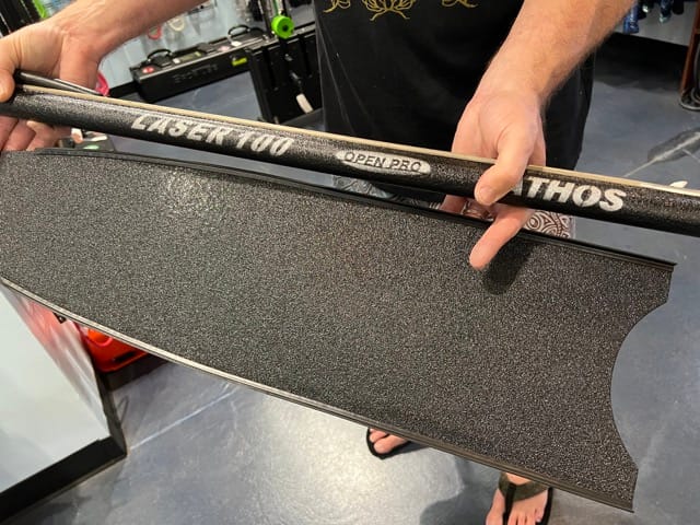 inside of dive shop holding freediving blade covered with truck bed liner