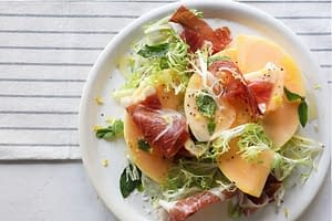Melon with Iberian Ham and Fresh Herbs – a seasonal Market menu dish at Boqueria