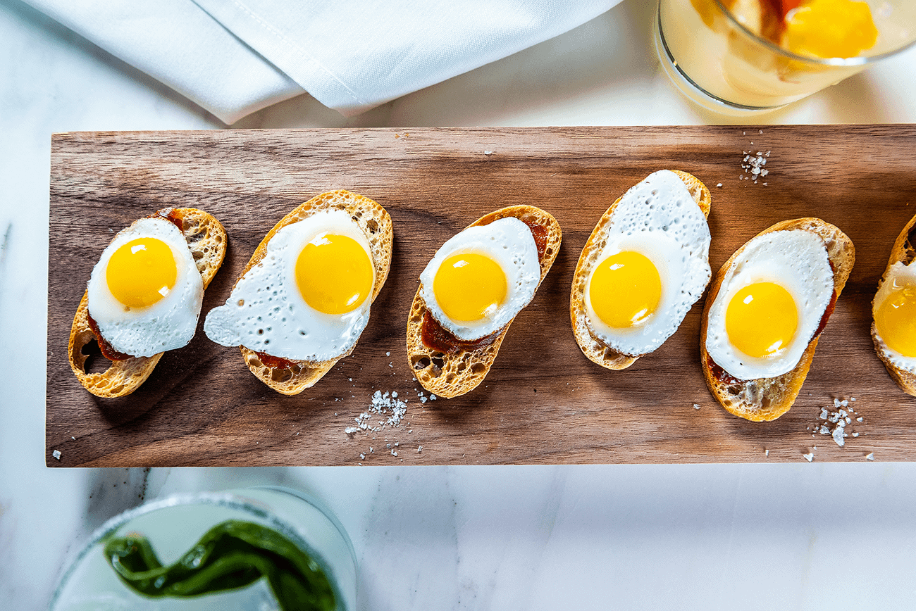 Cojonudo - Quail's eggs and chorizo on toast