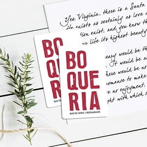 two Boqueria gift cards on top of a holiday letter
