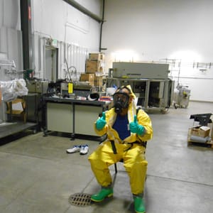 Hazardous materials training instructor in hazmat suit
