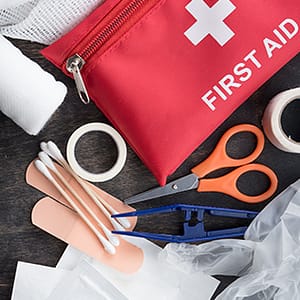 first aid kit laid out on table