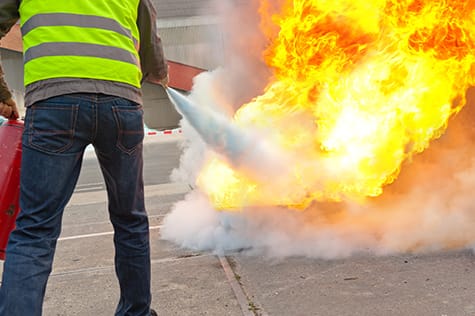 General Workplace CPR, FA, Fire Safety Category-OSHA fire extinguisher course Code 3 Safety & Training instructor teaching proper use of fire extinguishers