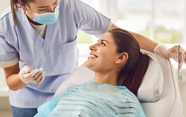 Doctor-dentist-conducting-a-dental-examination.