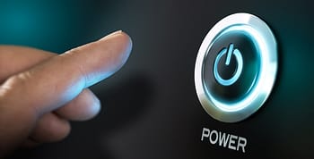 A finger approaching an eliminated power button