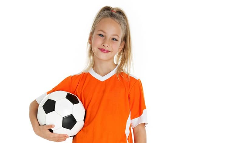 sports girl with soccer ball