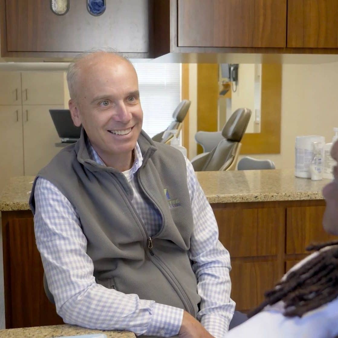 Dr. Vermette smiling at a patient