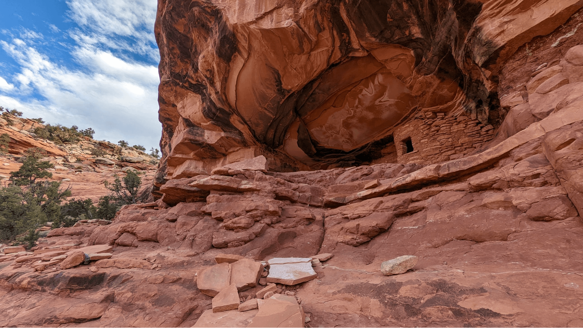 An ancient Indigenous dwelling set among the sandstone rock and cliff