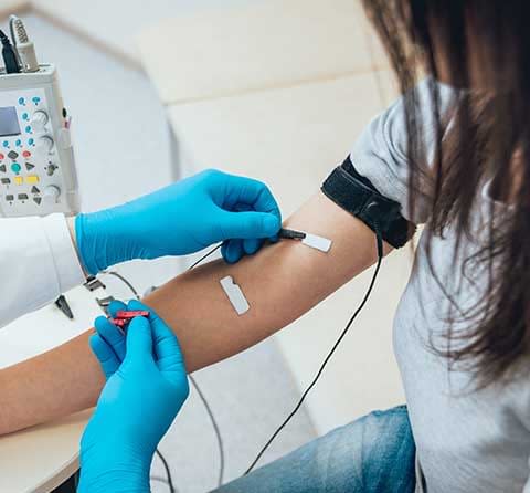 Orthopedic doctor performing nerve evaluations on a patient at Azalea Orthopedics in Palestine, Texas.
