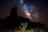 Bright Milky Way over silhouette rock formation