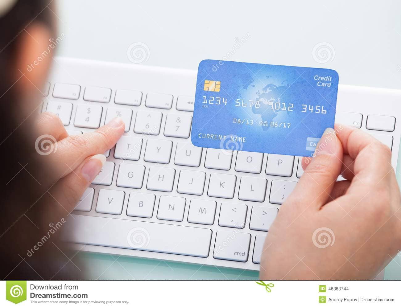 woman entering credit card information