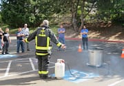 Code 3 Safety & Training instructor teaching proper use of fire extinguishers
