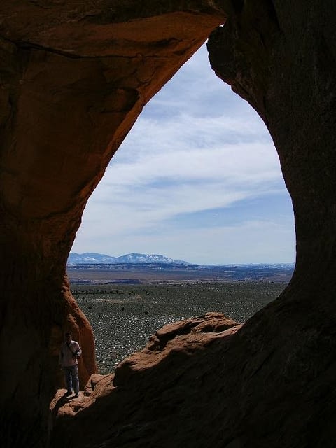 Distant mountains through "frame" of a rock arch.