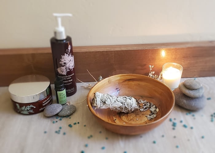 Countertop with spa products and sage smudge