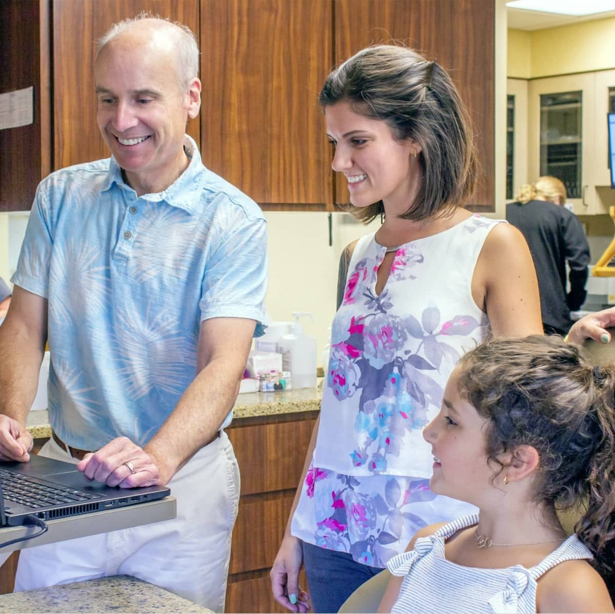 dr. vermette and patients during consultation