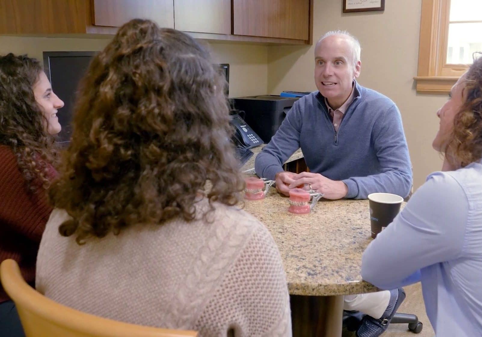 Dr. Vermette talking to a patient and family